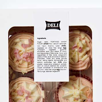 Pink and white cupcakes in a white and clear plastic box with a ingredient label