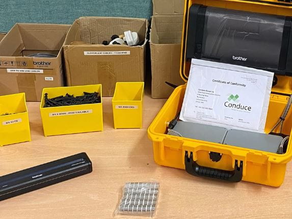 Conduce's printer and charging kit, containing a Brother PJ-7 series A4 thermal printer, stored with the eTechLog8 tablet in a tough plastic case