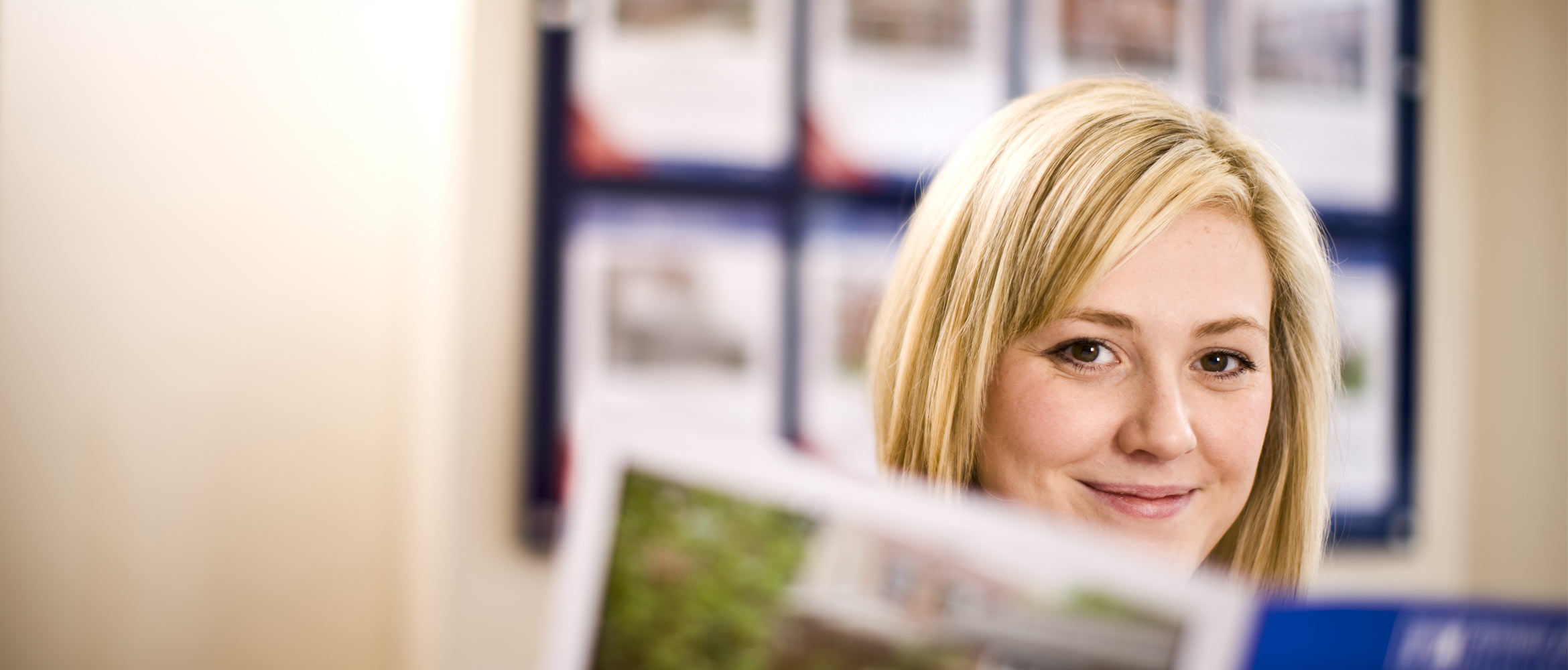 woman reading a leaflet