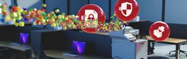 Červené bubliny s ikonami zámku, štítu a hackera na obrázku kanceláře