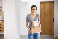 Woman carrying packages of Brother supplies