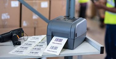 TD thermal transfer desktop printer printing label in warehouse