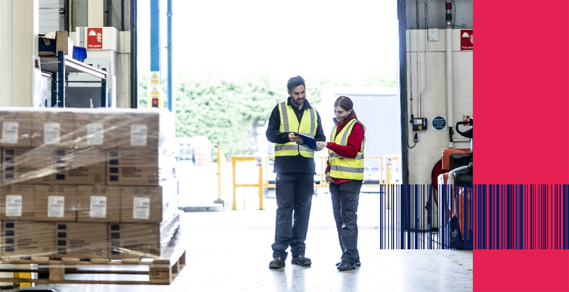 Brother colleagues in a factory with boxes