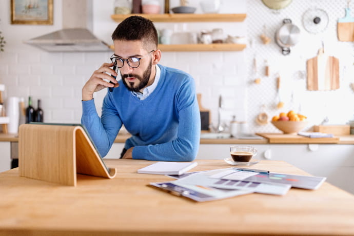 An IT professional working from a hybrid work from home set up
