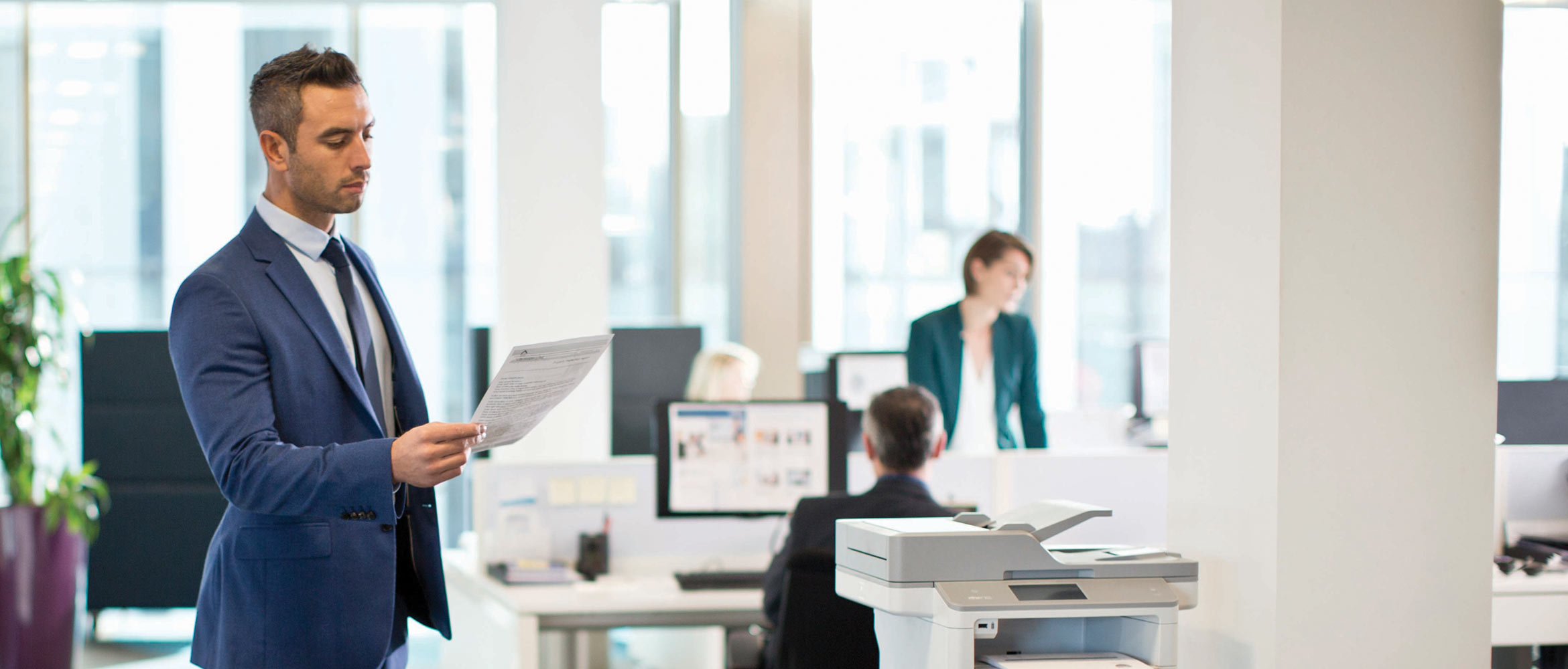 Three colleagues working in an office 