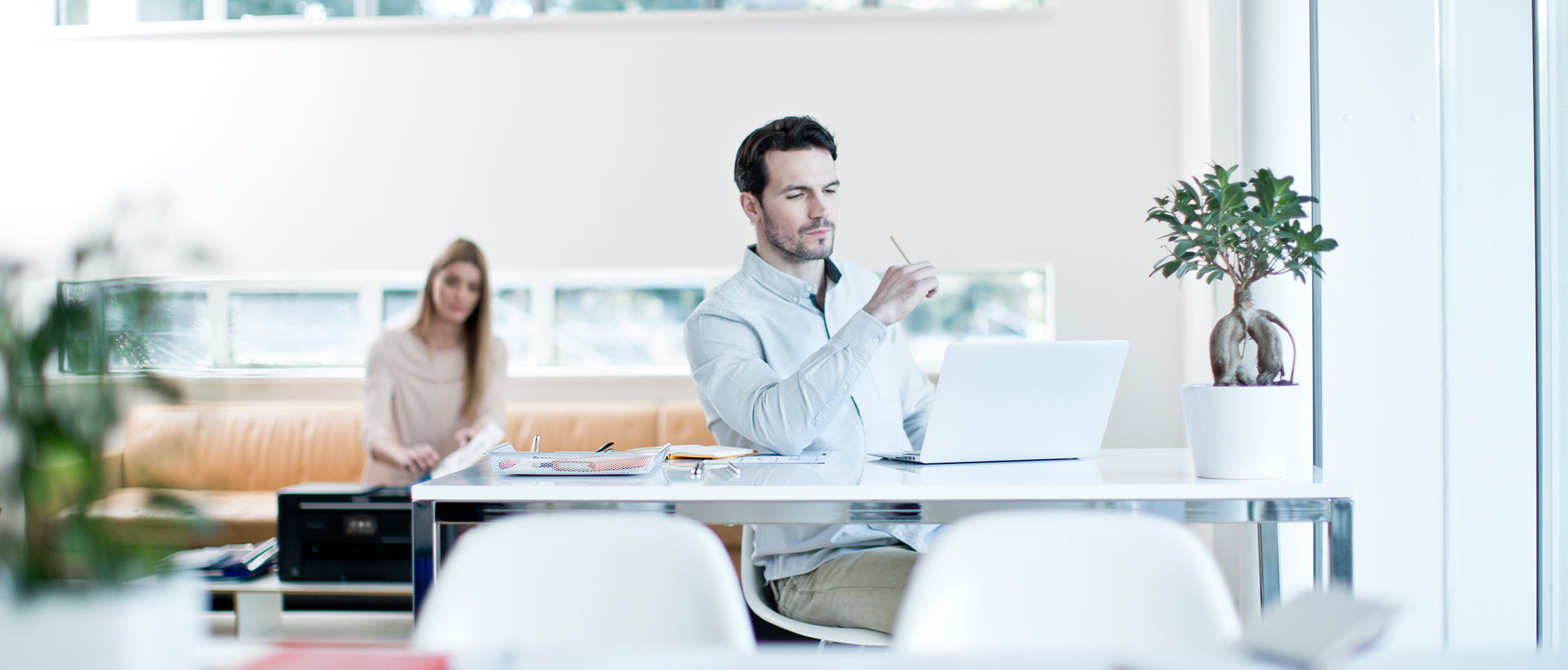 Man sitting at a desk working in an office