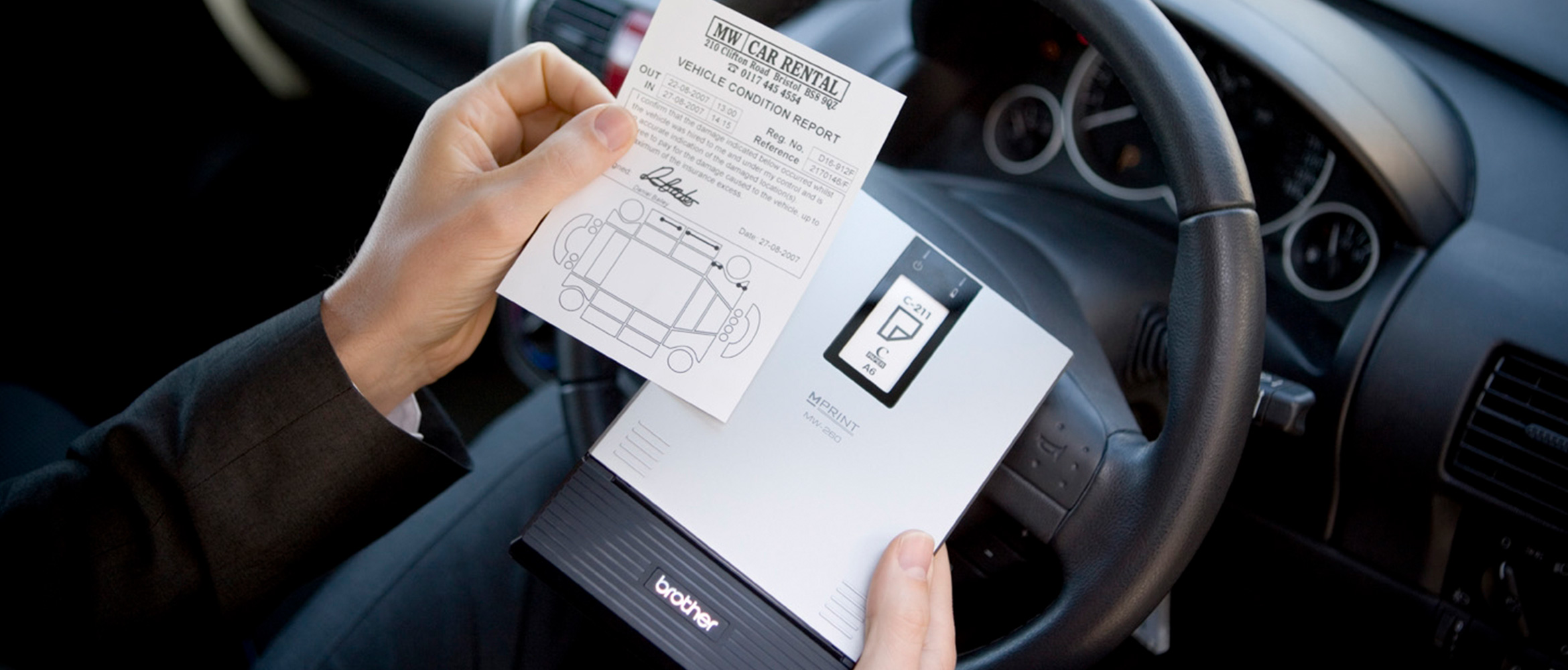 Individual in car using Brother MW range  mobile printer