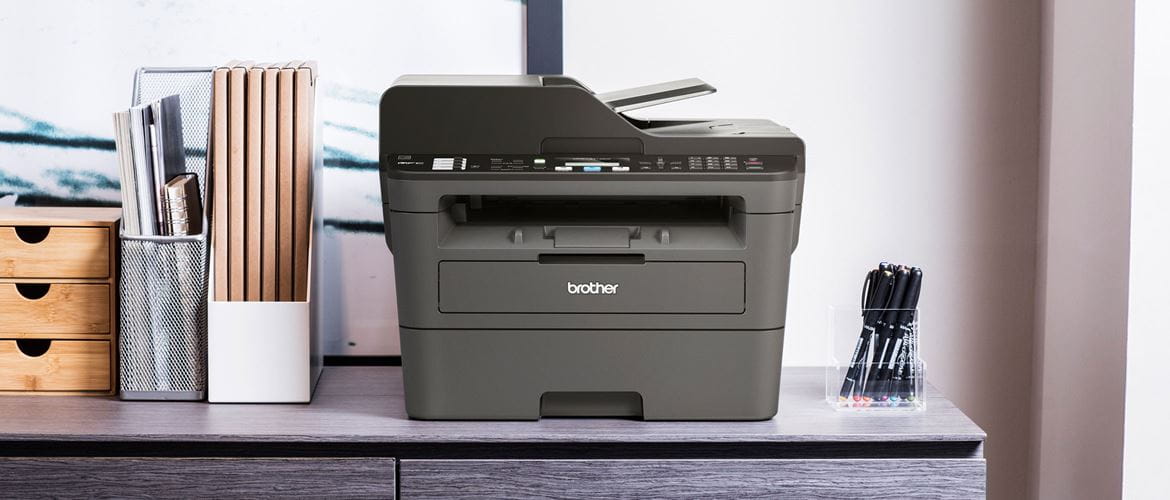 Black Brother printer situated on a desk 