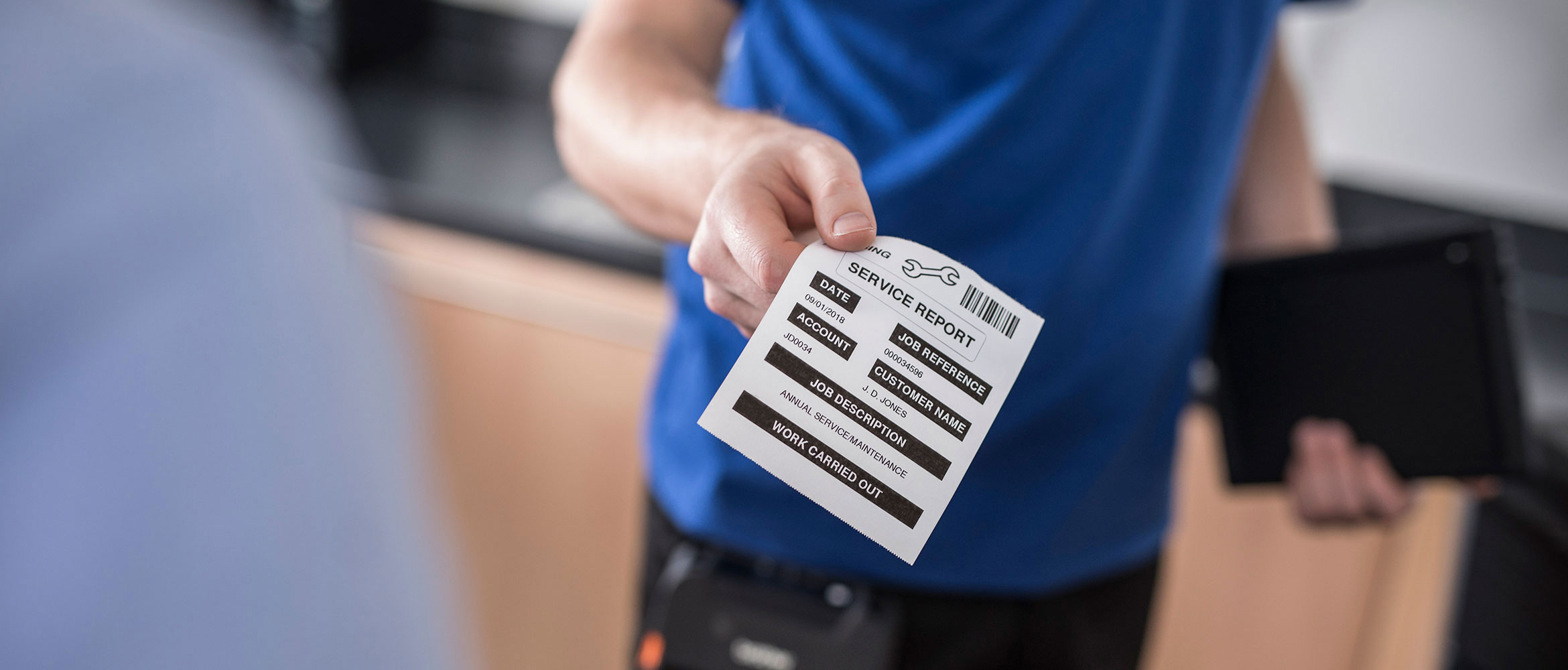 Field workman handing statement of work to customer