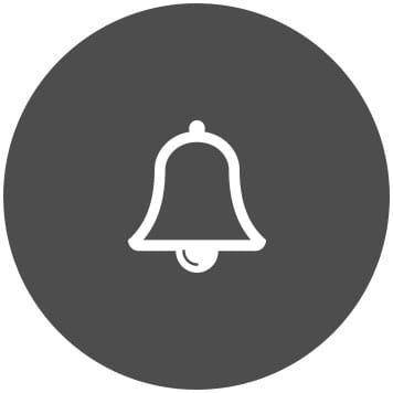 White bell icon on dark grey circle