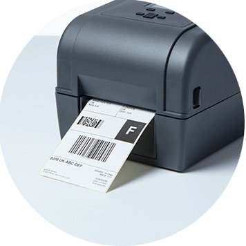 „Brother“ TD-4T etikečių spausdintuvas su atspausdinta siuntimo etikete