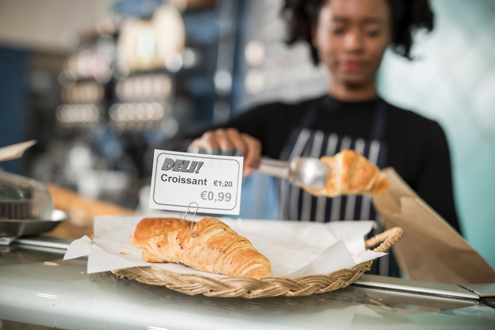 In-store food label on croissants showing price reduction