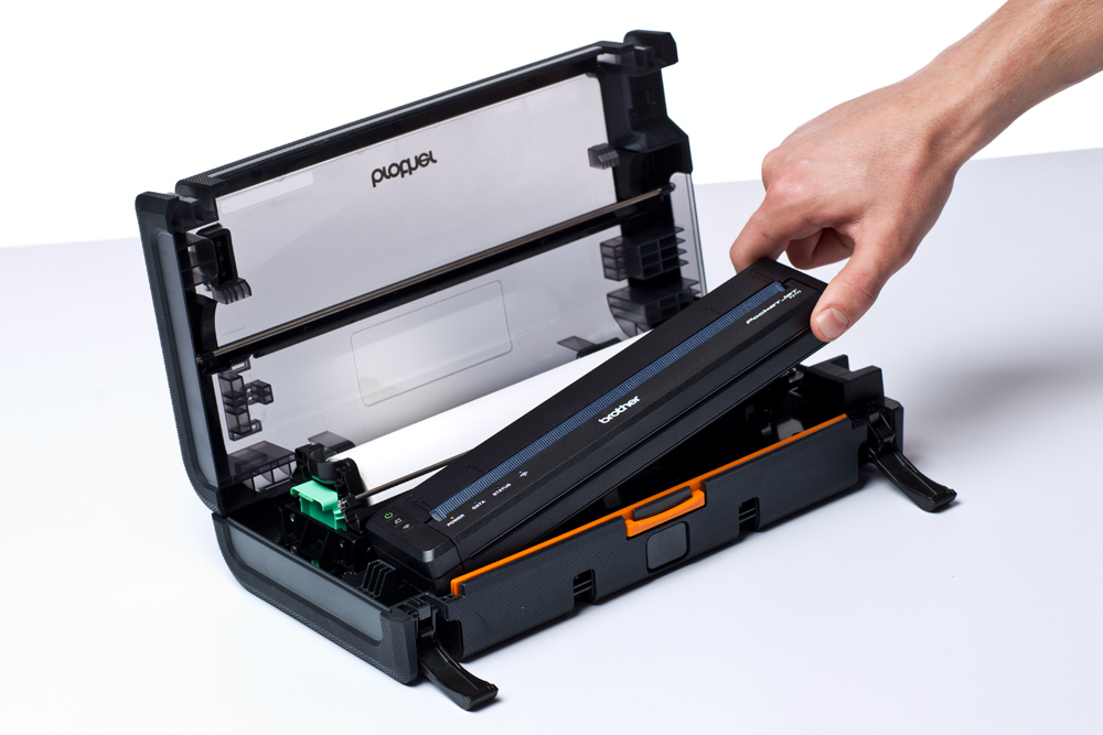 Man placing PJ in mobile carry case