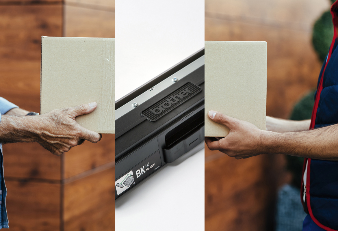 Two people holding boxes and a toner cartridge in the middle 