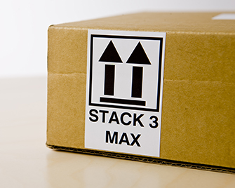 Brother DK label printed on QL label printer showing how to stack boxes