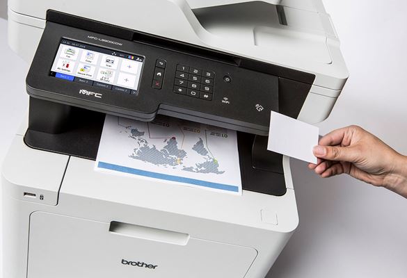 Person using NFC Card to securely print document from Brother MFC-L8900CDW multifunction colour laser printer