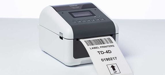 Brother TD label printer with label being printes