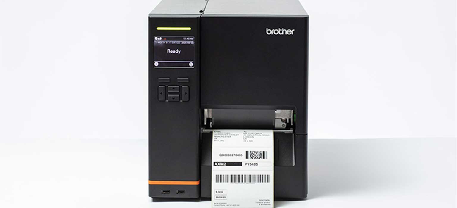 Brother black TJ industrial label machine with label being printed