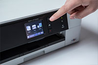 White inkjet with finger pointing out touchscreen