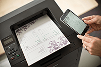 Image of a person printing a document from a mobile device