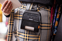 RJ 3 inch on belt clip on lady with check trousers close up