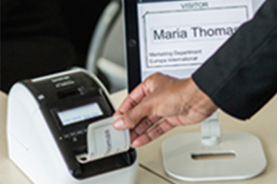 QL-820NWBVM visitor badge printer and iPad tablet 