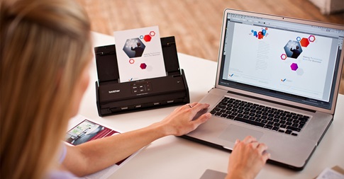 Lady printing from her computer