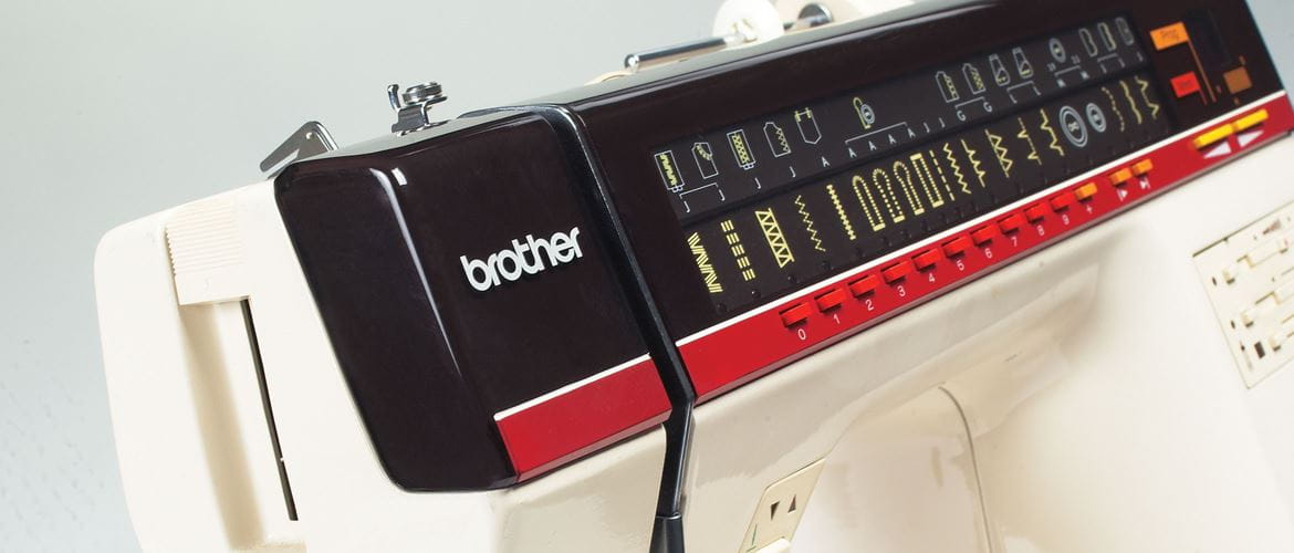 Cream, black and red Brother sewing machine 