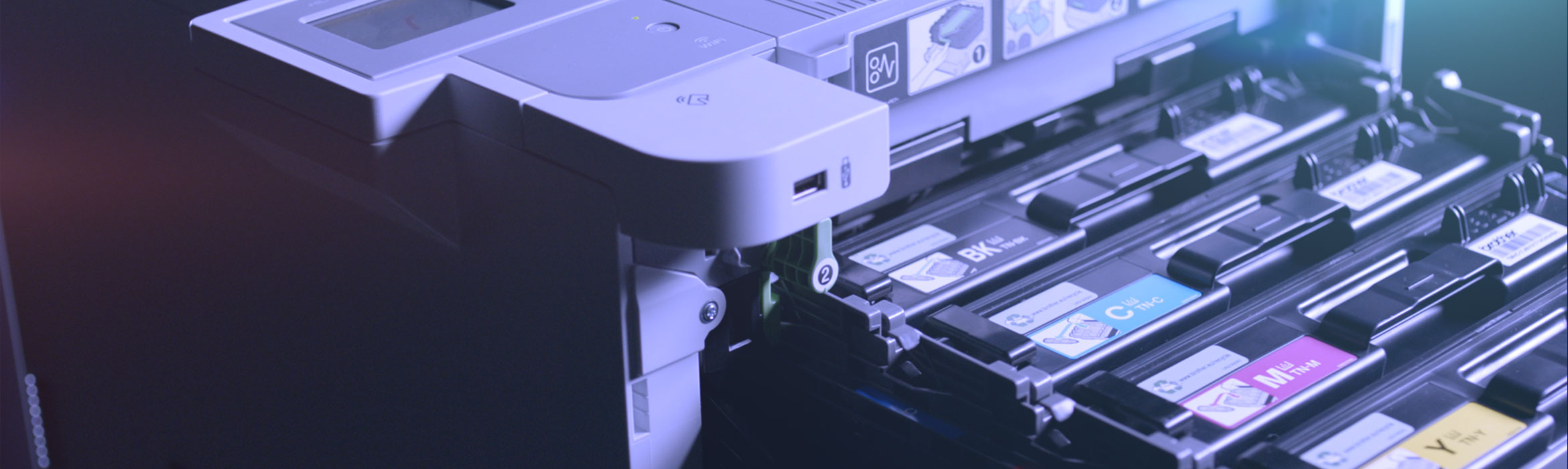 Brother HL-L9310CDW business printer with toner cartridges pulled out from printer