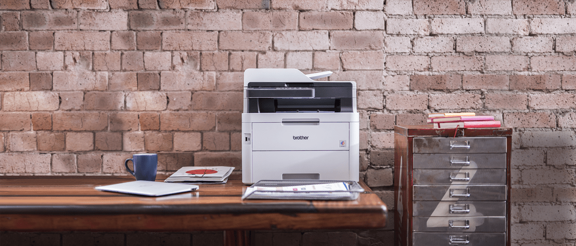 Brother DCP-L3550CDW colour laser printer on a desk