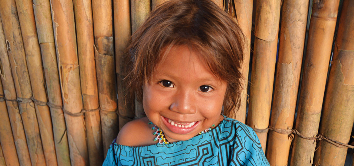 Young girl supported by Cool Earth smiling