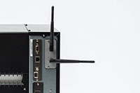 WLAN and Bluetooth interface accessory attached to Brother TJ printer
