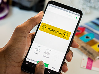 P-touch Design&Print app on smartphone being used to create a label