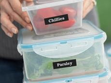 Kitchen plastic food containers labelled with a Brother P-touch label