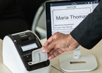 QL-820NWBVM visitor badge printer and iPad tablet