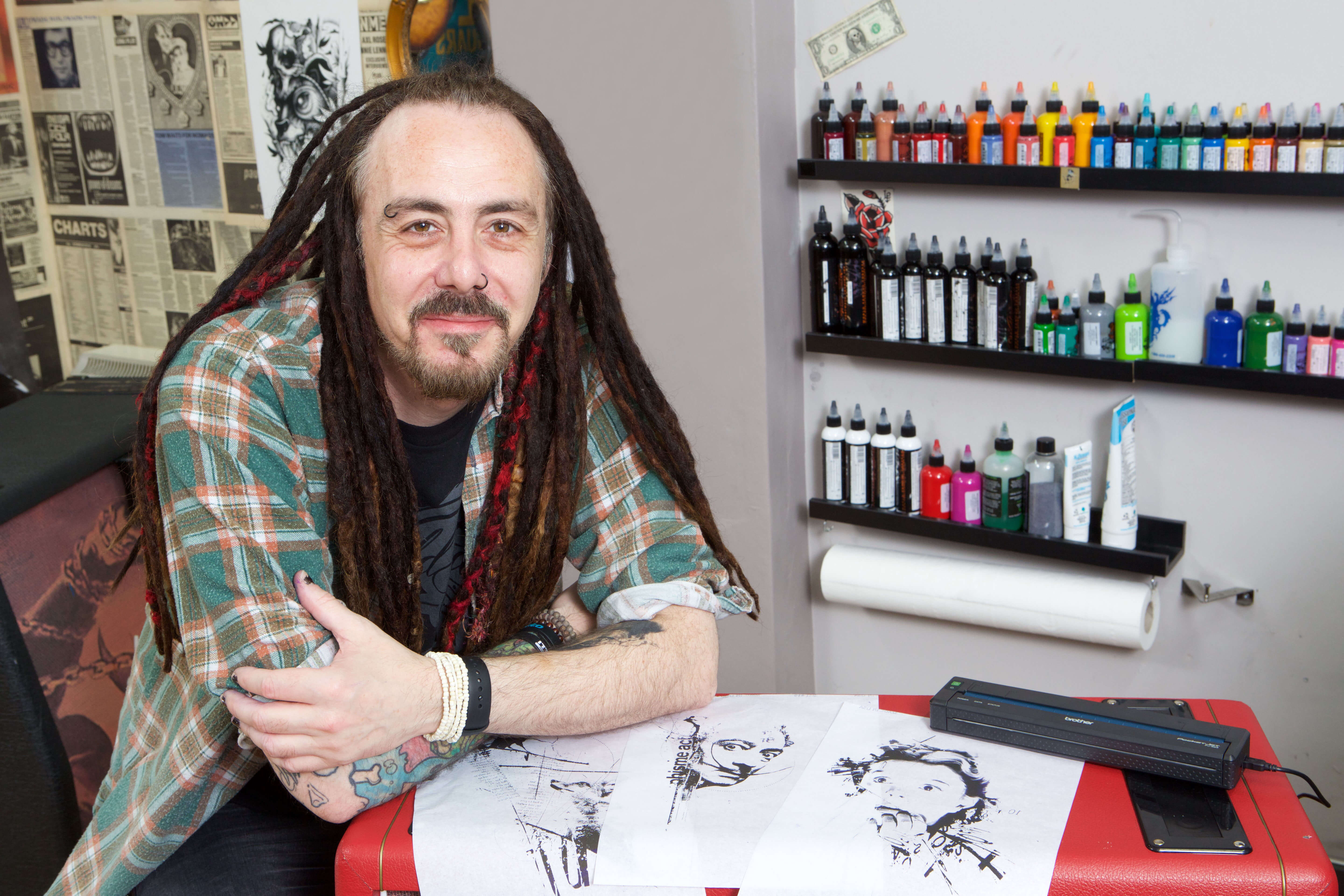 Tattoo artist Paul Talbot using Brother PJ7 device
