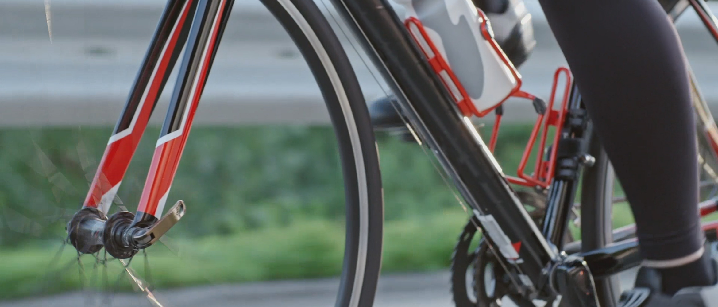 person riding a red bike