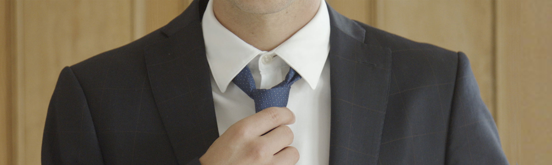 Man wearing a suit and tie