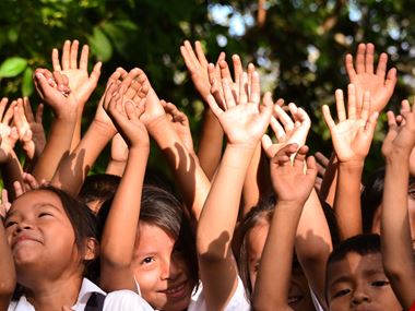 Kids waving hands