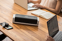 ADS-1200-om-a-desk-with-people-working