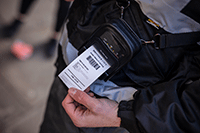 RJ 2 inch printing receipt on shoulder strap on enforcement officer