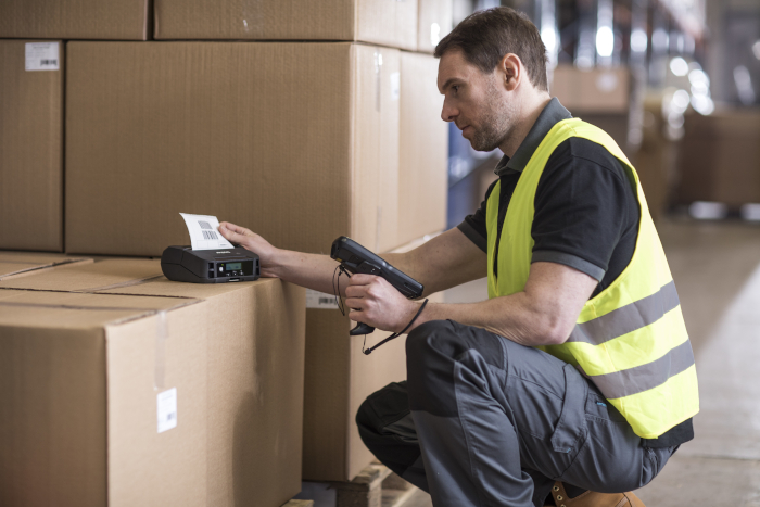 Brother RJ-4230B and man in warehouse