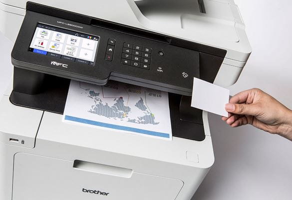Brother MFC-L8900CDW multifunction colour laser printer hand holding NFC card for secure printing