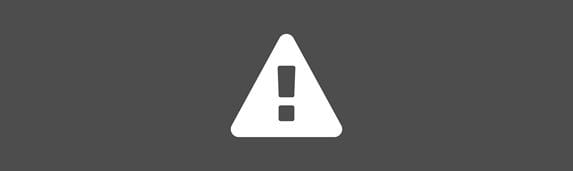 white hazard warning sign icon against an grey background