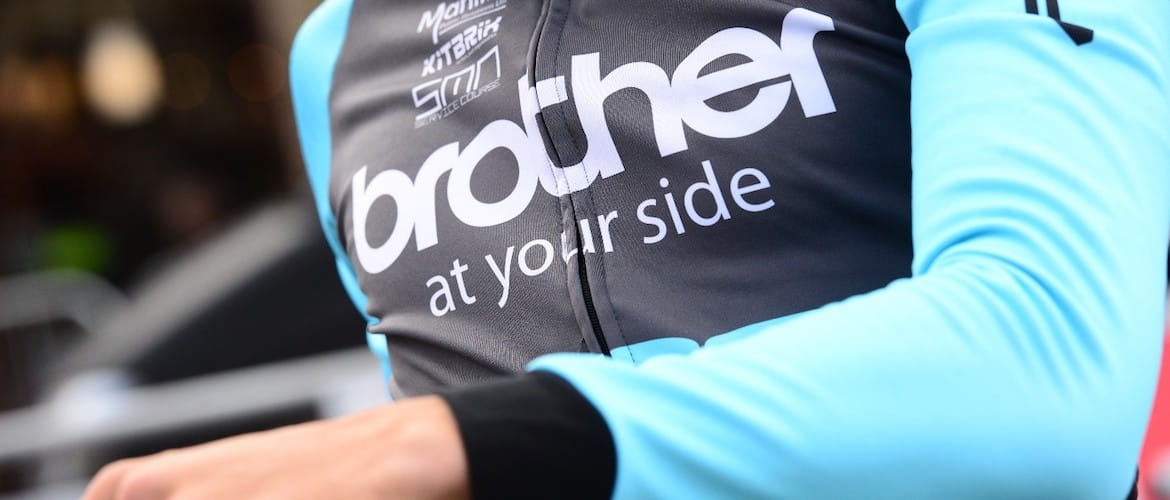 cycling kit with Brother logo across the chest