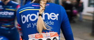 Close-up of Brother UK-FusionRT cyclist's back wearing team jersey