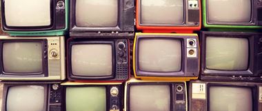 retro television screens and monitors stacked