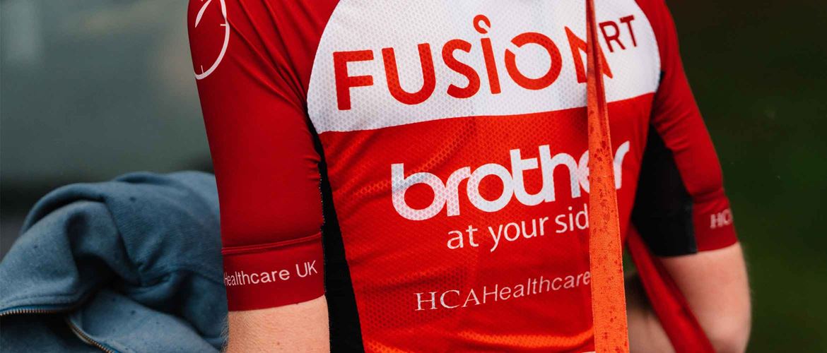 The back of Team Fusion RT's cycling jersey with the Brother logo