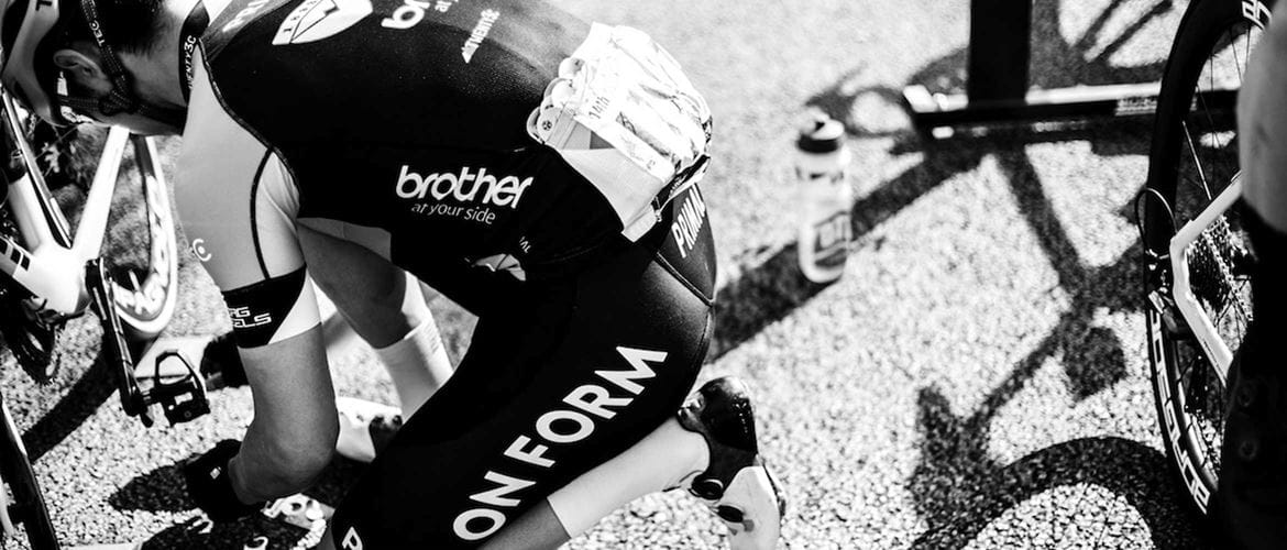 Cyclist from Team Onform with Brother branded clothes