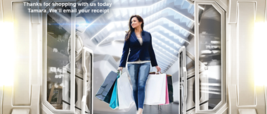 the future of retail, a shopper leaves with bags of shopping